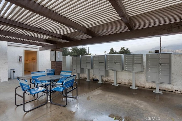 view of patio / terrace featuring mail area