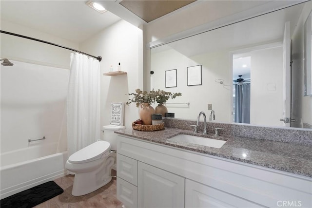 full bath featuring shower / bath combination with curtain, vanity, toilet, and wood finished floors