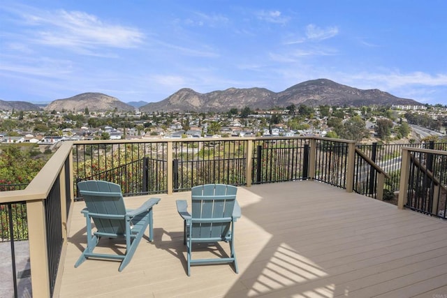 wooden terrace with a mountain view