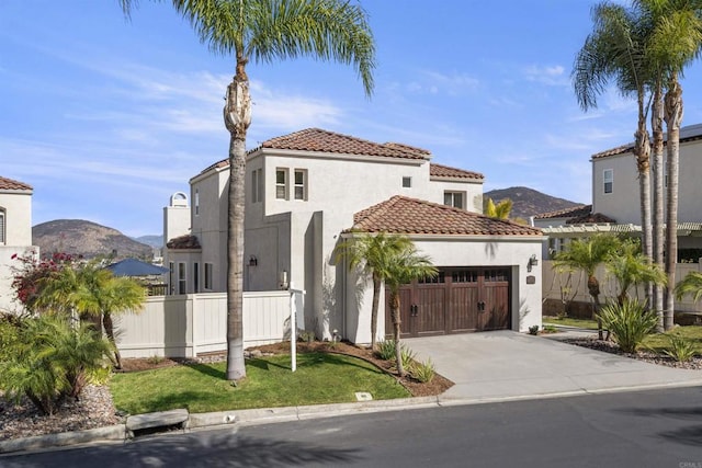 mediterranean / spanish-style house featuring a mountain view