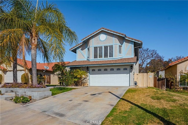 view of front of property with a garage and a front yard