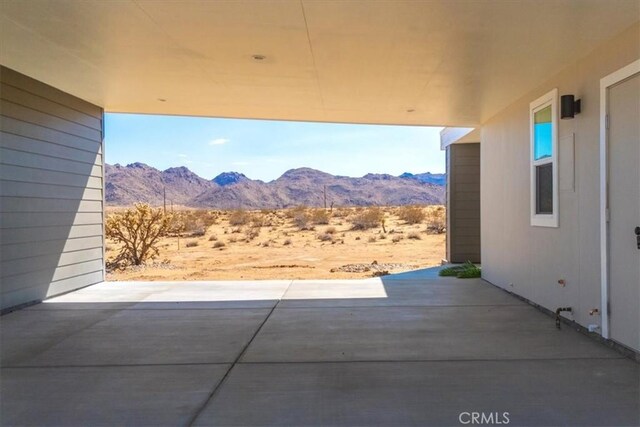 view of patio with a mountain view