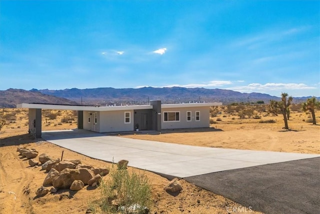 view of front facade with a mountain view