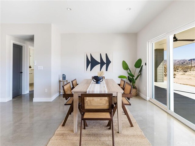 dining space with concrete floors