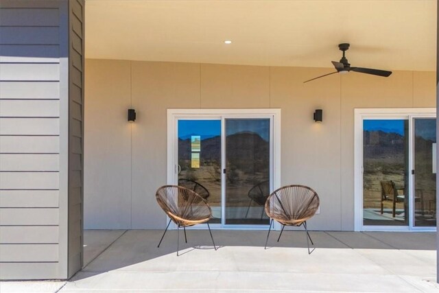 view of patio / terrace featuring ceiling fan