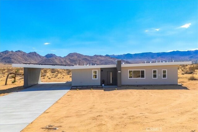 view of front of home with a mountain view