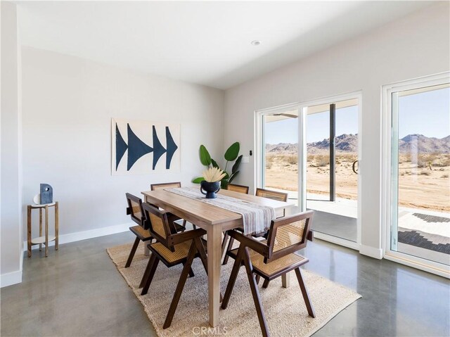 dining area with a mountain view