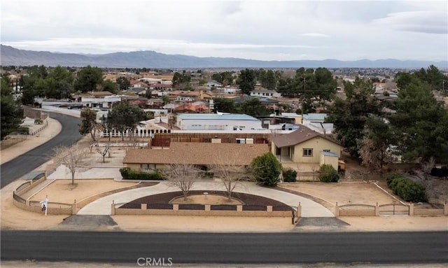 bird's eye view featuring a residential view and a mountain view