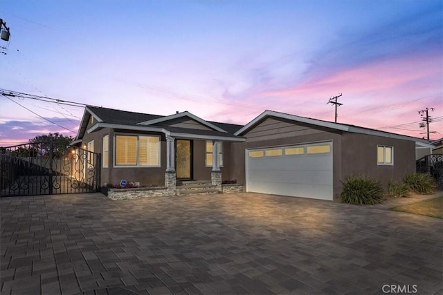 view of front of property featuring a garage