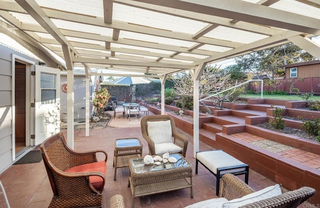 view of patio / terrace featuring outdoor lounge area and a pergola