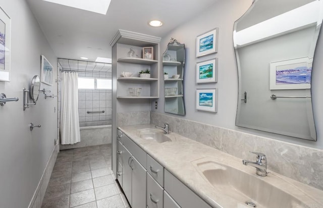 bathroom with shower / tub combo, vanity, and tile patterned floors