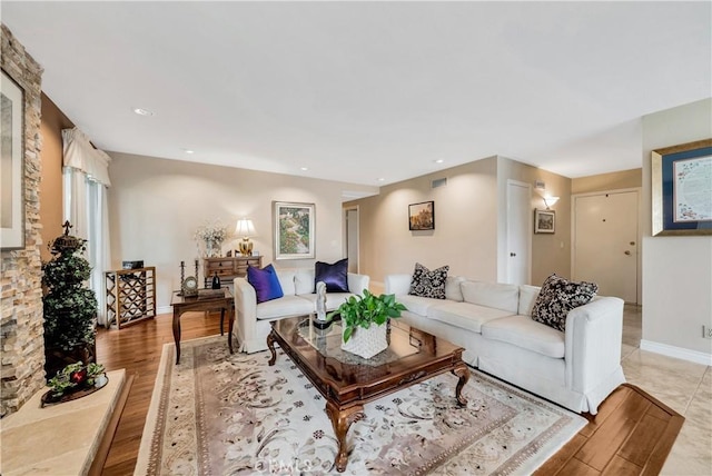 living room with light hardwood / wood-style floors