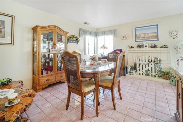 1308 Pleasant Valley Ave, Banning, CA 92220 - dining room with visible vents and light tile patterned floors