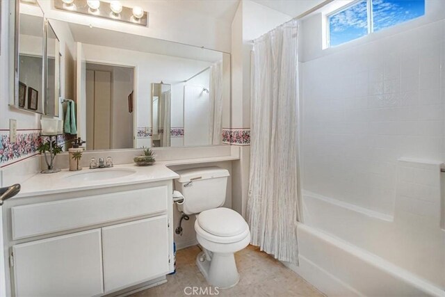 1308 Pleasant Valley Ave, Banning, CA 92220 - bathroom featuring shower / bath combination with curtain, vanity, toilet, and tile patterned floors