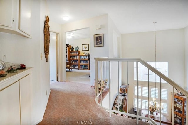 1308 Pleasant Valley Ave, Banning, CA 92220 - corridor with an upstairs landing and light colored carpet