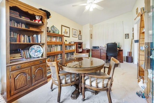 1308 Pleasant Valley Ave, Banning, CA 92220 - dining area featuring light carpet, ceiling fan, and lofted ceiling