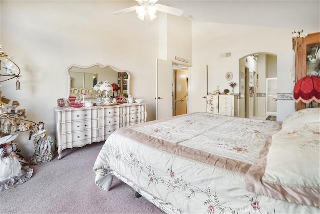 1308 Pleasant Valley Ave, Banning, CA 92220 - bedroom featuring visible vents, arched walkways, a ceiling fan, carpet flooring, and high vaulted ceiling