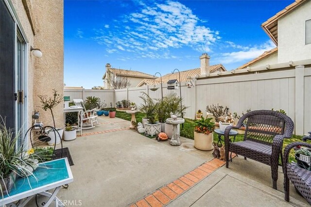 1308 Pleasant Valley Ave, Banning, CA 92220 - view of patio featuring a fenced backyard