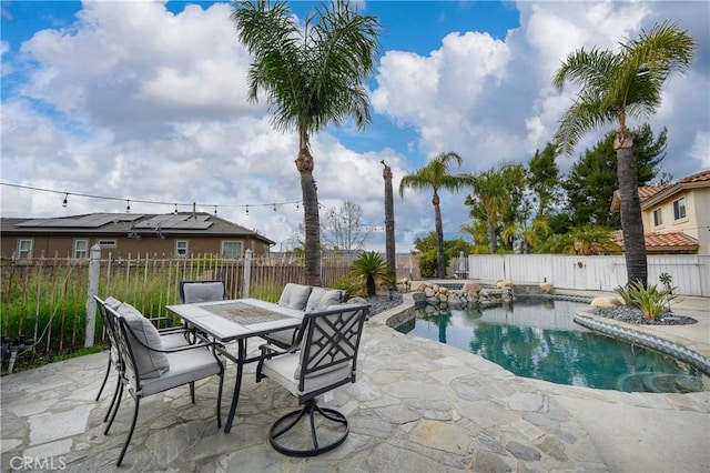 view of swimming pool featuring a patio