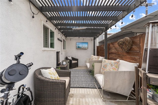 view of patio / terrace with a pergola, outdoor lounge area, and fence