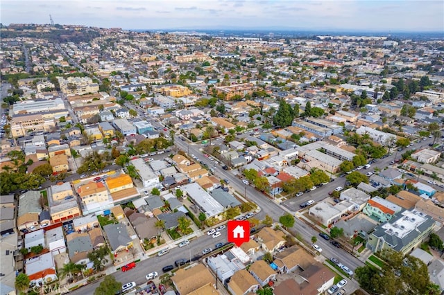 birds eye view of property with a residential view