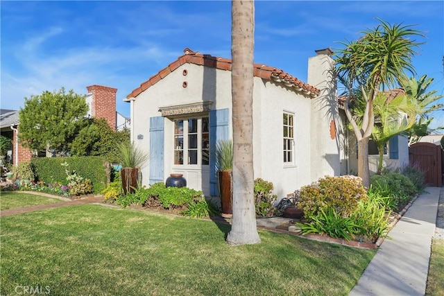 view of home's exterior featuring a yard