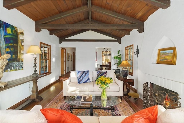 living room featuring wood ceiling, wood-type flooring, and vaulted ceiling with beams