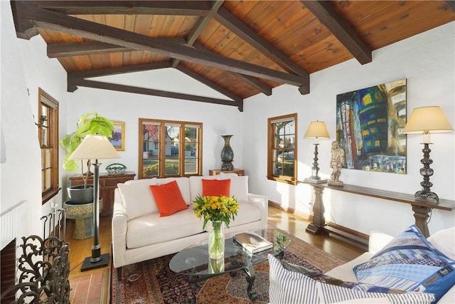 living room with light hardwood / wood-style floors, lofted ceiling with beams, and wooden ceiling