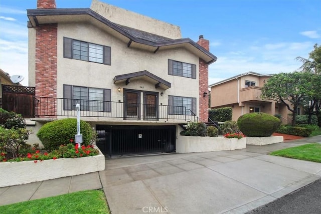 front of property with a garage