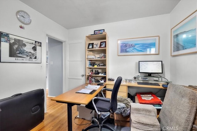 home office featuring light hardwood / wood-style floors