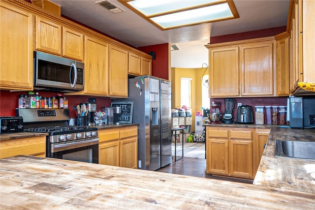 74384 Rocky Rd Unit 29, Palms, CA 92277 - kitchen with appliances with stainless steel finishes