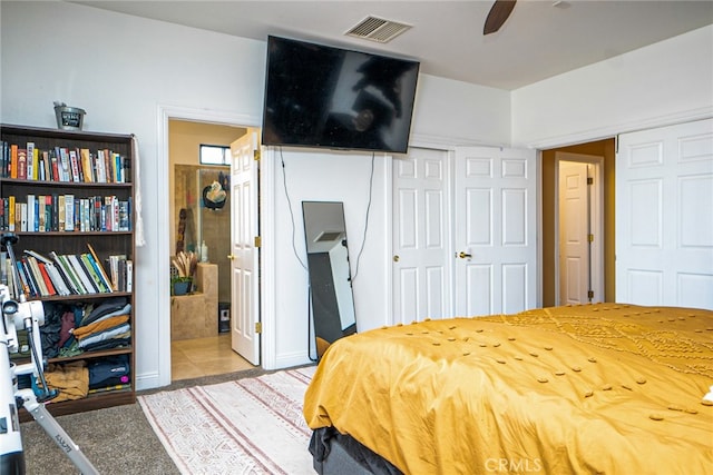 74384 Rocky Rd Unit 29, Palms, CA 92277 - bedroom with ensuite bathroom and carpet flooring