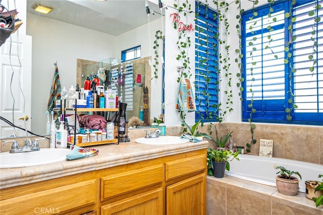74384 Rocky Rd Unit 29, Palms, CA 92277 - bathroom featuring double vanity and a bath