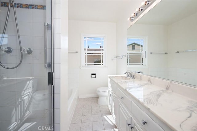 full bathroom featuring vanity, tile patterned floors, plus walk in shower, and toilet