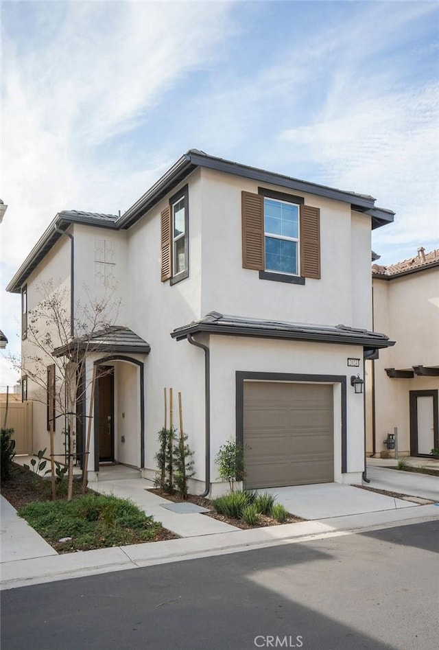 view of front of home with a garage