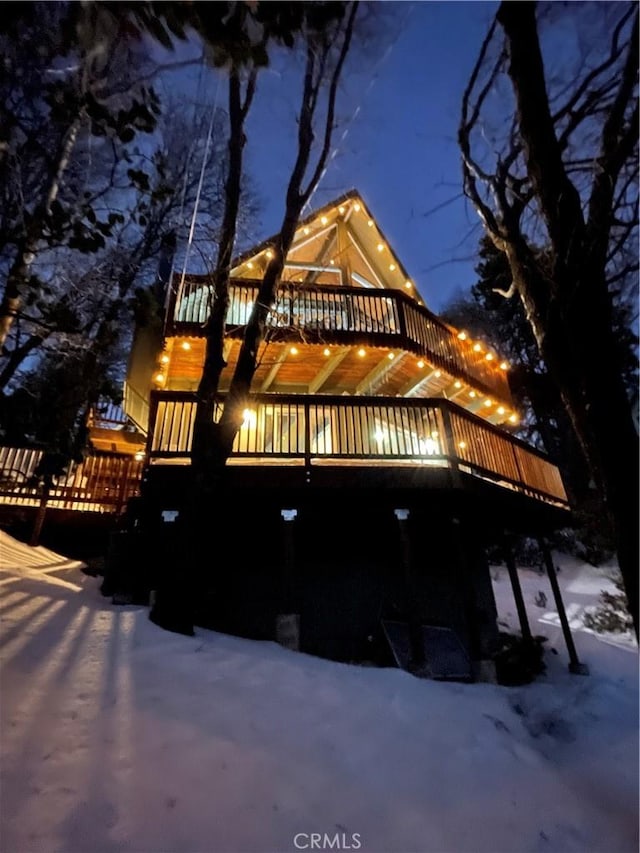 view of front of home with a deck