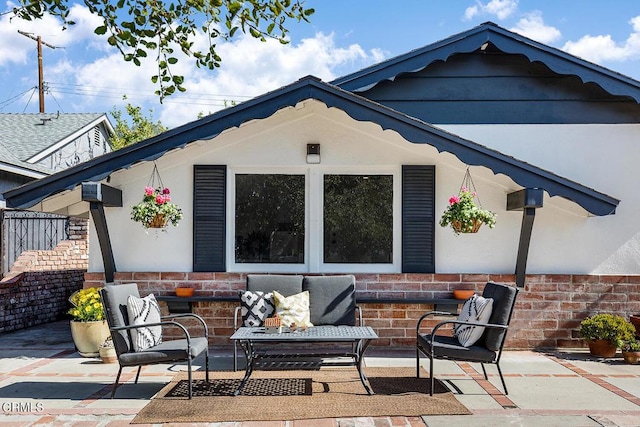 back of house featuring a patio