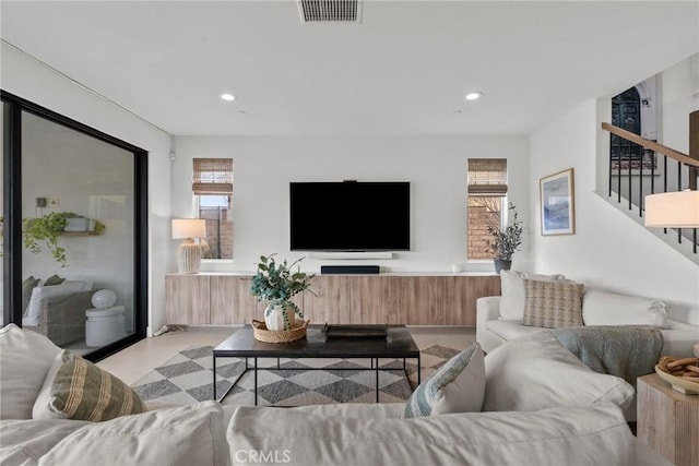 living room featuring plenty of natural light