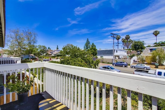 balcony featuring a residential view