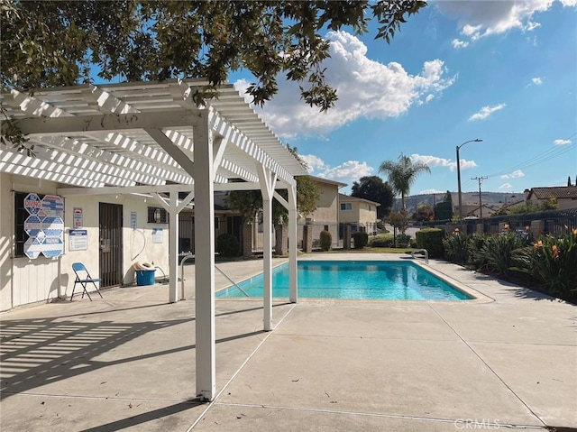 view of pool with a pergola