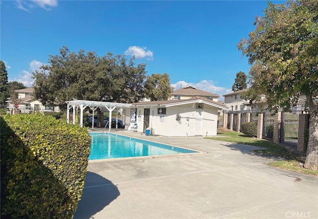 view of pool featuring a patio area and a pergola