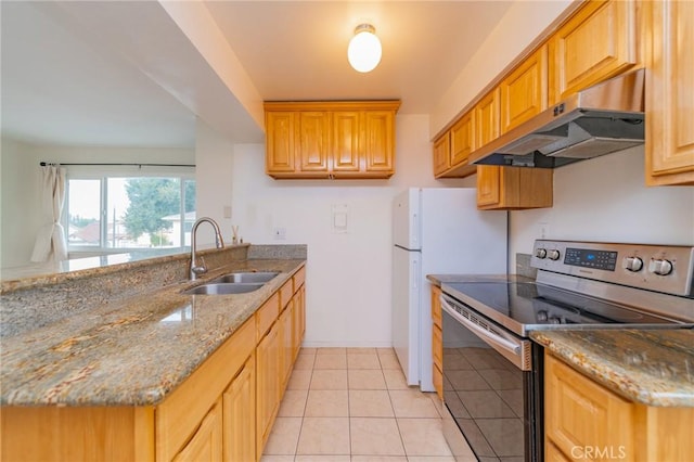 kitchen with stone counters, sink, light tile patterned floors, electric range, and kitchen peninsula