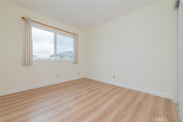 empty room featuring light hardwood / wood-style floors