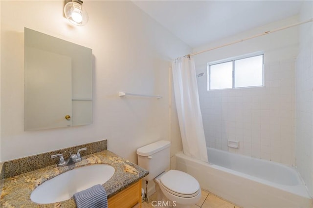 full bathroom with vanity, tile patterned floors, toilet, and shower / bath combo with shower curtain