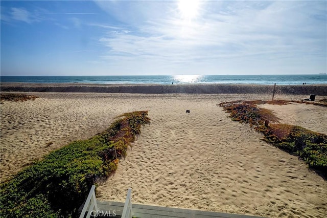 property view of water with a beach view