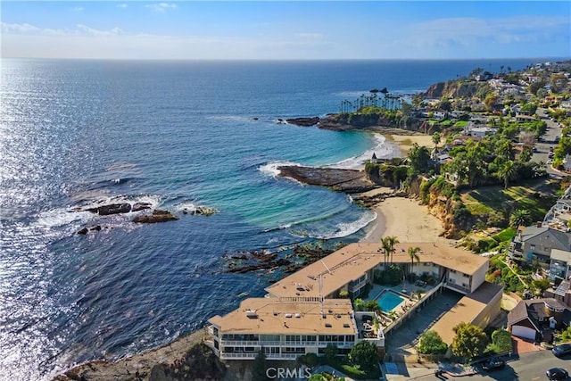 bird's eye view with a beach view and a water view