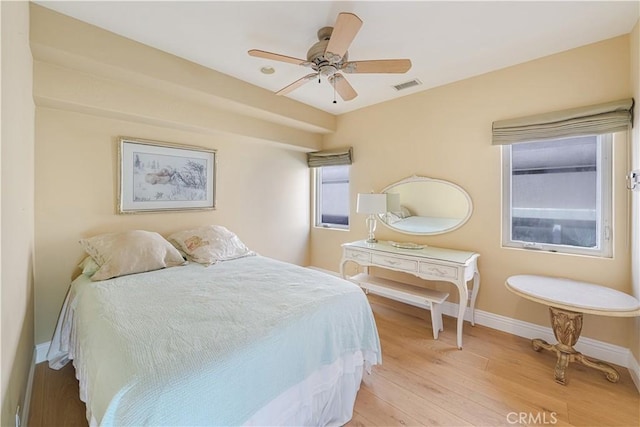 bedroom featuring ceiling fan and light hardwood / wood-style flooring