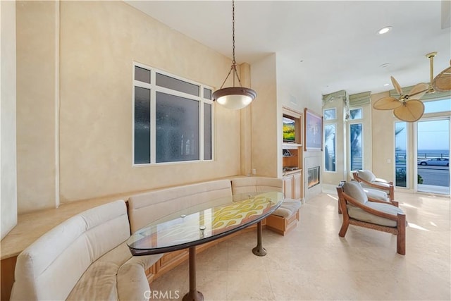 tiled dining room with breakfast area