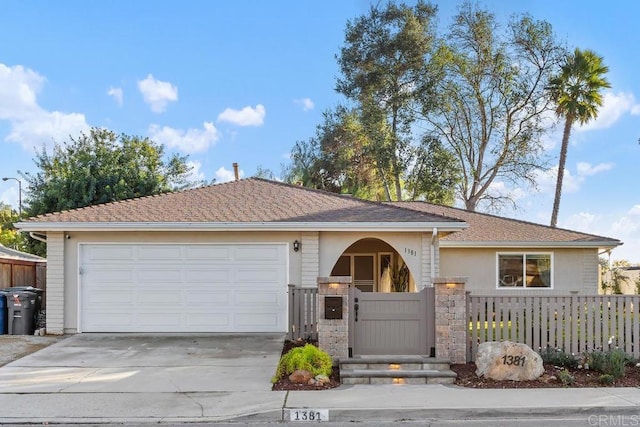 ranch-style home featuring a garage