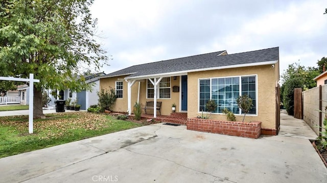 ranch-style house with a porch